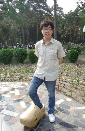 梁教员的照片_哈工大家教中心
